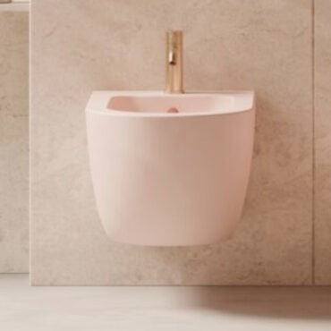 matt pink ceramic wall-mounted bidet with hole unica 52 alice ceramica
